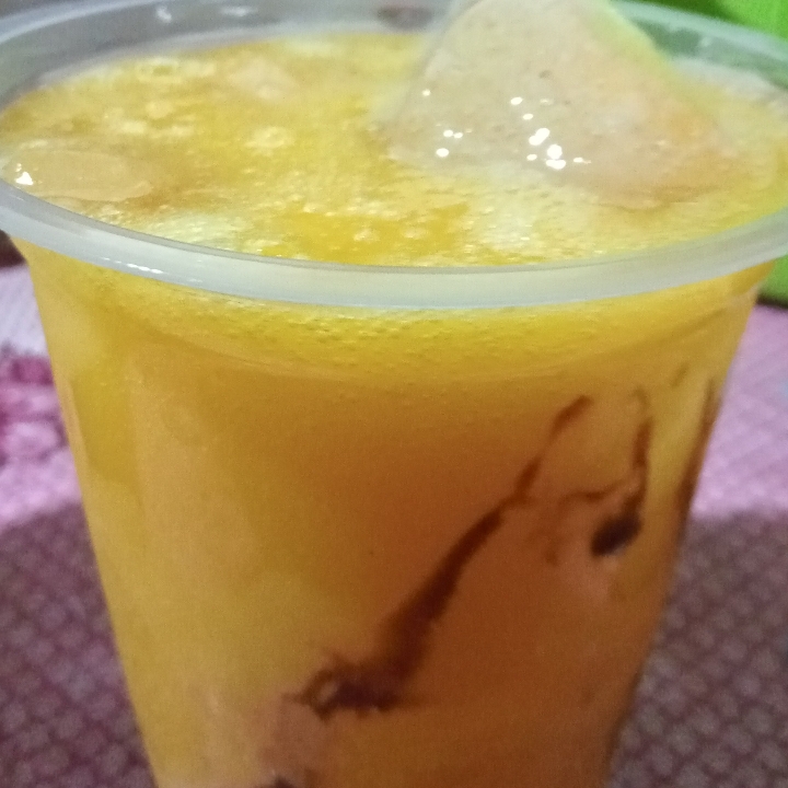 Jus Mangga Kueni