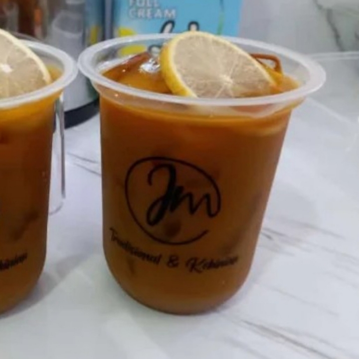 Kunyit Asam Madu Lemon Es
