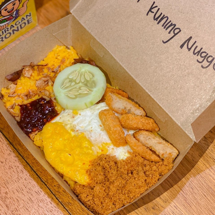 Nasi Kuning Chicken Nugget