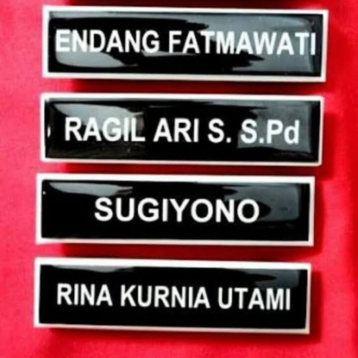 Papan Nama Dada