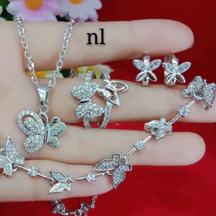 Perbiasan Titanium Xiuping Dan Permata Zircon 5